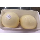 Two ostrich eggs.