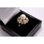 A 14ct gold and pearl dress ring.