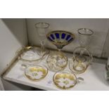 A pair of engraved and gilt decorated wine tasters, similar bowl, vase and basket together with a