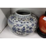 A Chinese blue and white circular bowl or vase.