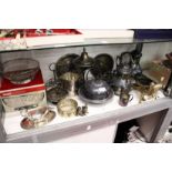 A quantity of plated ware to include a kettle on stand a coffee pot etc.