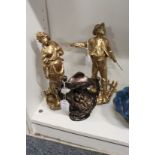 A pair of gilt painted spelter figures and a small metal vase.