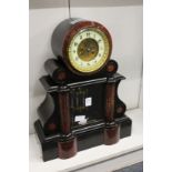 A good large Victorian slate mantle clock with mercury pendulum.