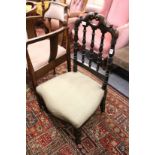 A Victorian spindle back occasional chair.