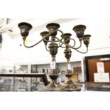A pair of plated three light candelabra.
