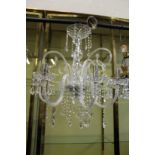 A Venetian style glass six branch chandelier.