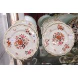 A set of five porcelain plates decorated with flowers in the Imari palate.