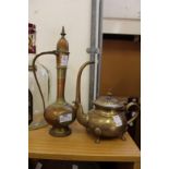 An eastern brass ewer and a similar teapot.
