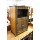 A small oak cupboard.