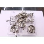 Three circular silver salts, an oval pedestal dish with engraved decoration and other small silver