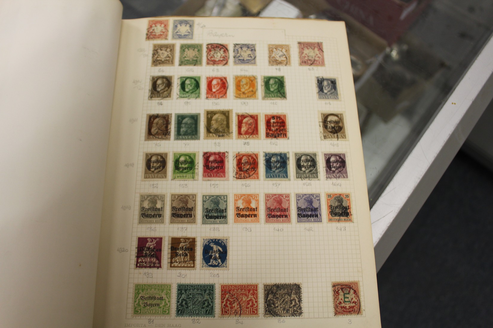 Stamps, a green binder containing World, mostly used.