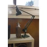 An old angle poise lamp and a soda syphon.