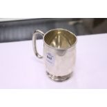 A plain silver half pint mug, Sheffield 1960, 6ozs.
