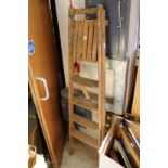 An old wooden step ladder.