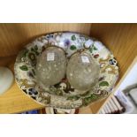 A pair of cut glass ceiling shades with ormolu mounts together with a floral bowl.