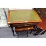 A mahogany single drawer side table with leather inset top.