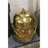 A Dutch copper and brass lidded coal box.