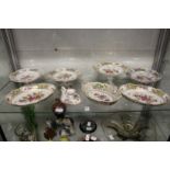 A good collection of Dresden floral decorated porcelain to include comports, dishes and a chamber
