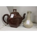 A Chinese Yixing teapot and a small bottle vase (AF).