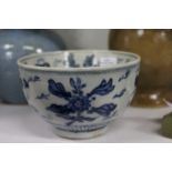 A small Chinese blue and white bowl.