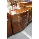 A 19th century mahogany bow front chest of two short and three long graduated drawers on bracket