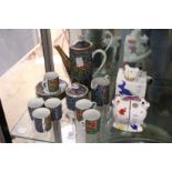 Villeroy & Boch, a pair of amusing cat salt and peppers, together with a matching teapot and a