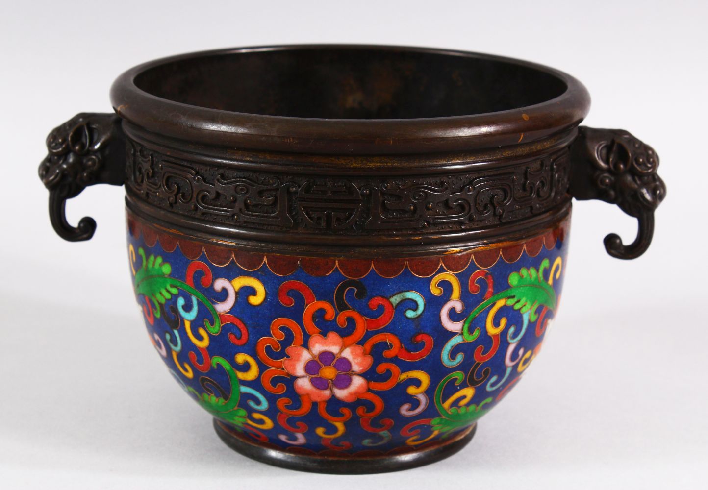 A CHINESE CLOISONNE TWIN HANDLE INCENSE BURNER - the body with a lower band of cloisonne enamel