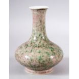 A CHINESE PEACH BLOSSOM GLAZED PORCELAIN BOTTLE VASE, six character mark to base, 16cm high.