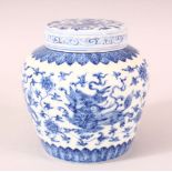 A SMALL CHINESE BLUE AND WHITE PORCELAIN POT AND COVER, painted with mythical creatures amongst