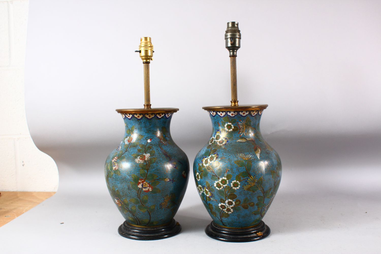 A PAIR OF CHINESE BLUE GROUND CLOISONNE VASES / LAMPS, decorated with native flora, butterflies - Image 3 of 6