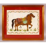 AN INDIAN PAINTING OF A HORSE ON SILK, with a floral border, framed and glazed, overall 55cm x