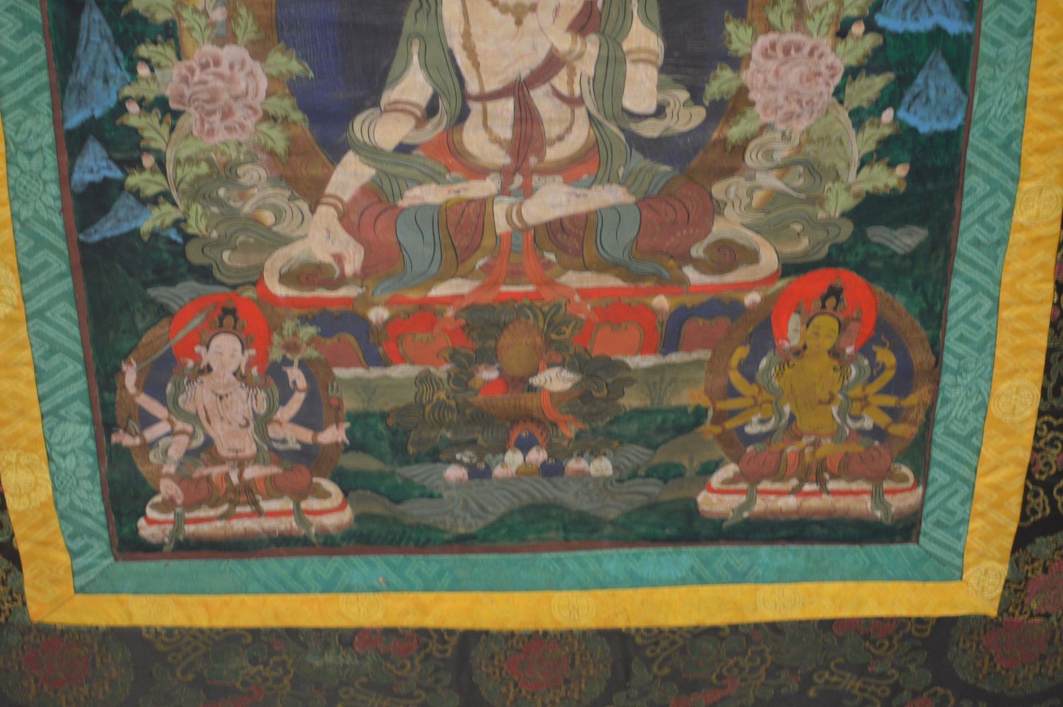 A GOOD LARGE 20TH CENTURY TIBETAN THANKA, mounted and framed, 120cm x 100cm. - Image 5 of 6