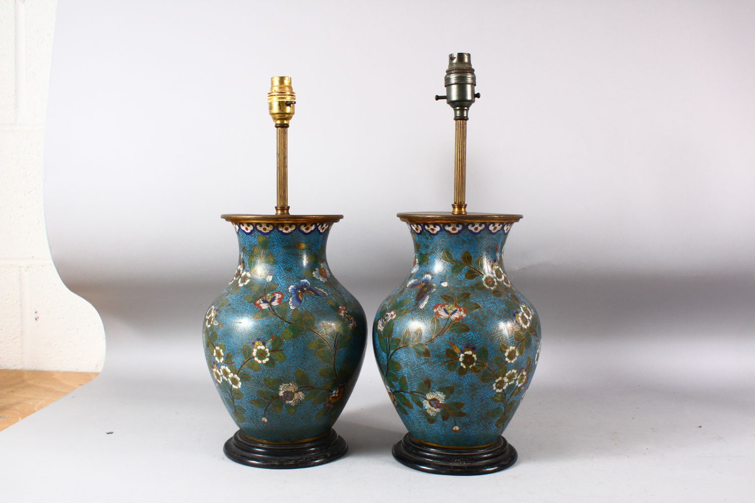 A PAIR OF CHINESE BLUE GROUND CLOISONNE VASES / LAMPS, decorated with native flora, butterflies - Image 4 of 6