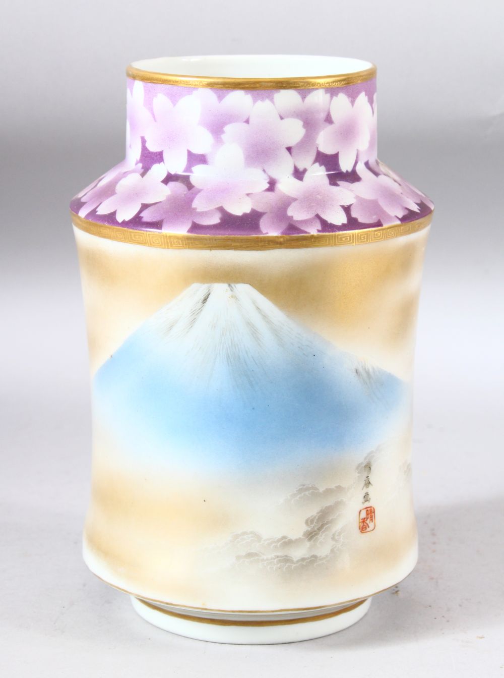 A JAPANESE MOUNT FUJI PORCELAIN VASE, the body painted with an atmospheric view of mount fuji with