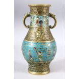 A CHINESE EXPORT CLOISONNE TWIN HANDLE VASE, the body with brick joint style blue ground with