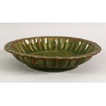 A CHINESE GREEN GLAZED RIBBED BOWL, 19.5cm diameter.