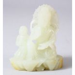 A CHINESE JADE CARVING OF A DEITY and attendant, 8cm high, base 7cm x 4cm.
