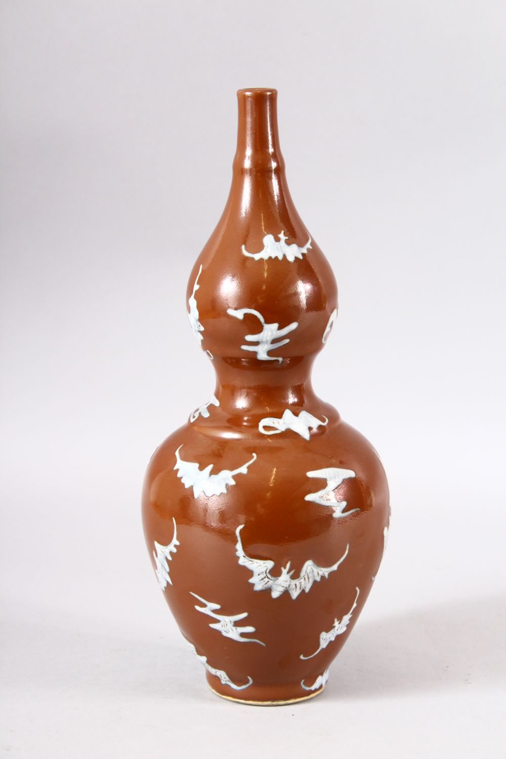 A CHINESE BROWN GLAZED DOUBLE GOURD PORCELAIN BAT VASE - decorated with many bats upon a cafe au - Image 2 of 7