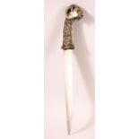 A GOOD 19TH CENTURY INDIAN SILVER HILTED RAM'S HEAD DAGGER, the hilt with moulded floral design