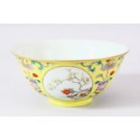A GOOD CHINESE FAMILLE JAUNE PORCELAIN BOWL, the exterior decorated with four roundels containing