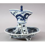 A CHINESE MING STYLE BLUE & WHITE PORCELAIN LIBATION CUP & STAND - the cup decorated with dragon,