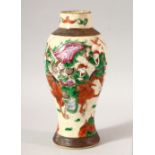 A SMALL CHINESE CRACKLE WARE VASE, painted with warriors, 21.5cm high.