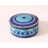 AN INDIAN ENAMELED SILVER LIDDED PILL BOX - the box with geometric banded decoration, with a
