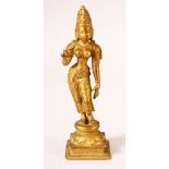 AN 19TH CENTURY SOUTH INDIAN BRONZE FIGURE, 16cm high.