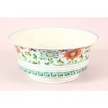 A GOOD CHINESE FAMILLE VERTE PORCELAIN BOWL, painted with colourful flowers, the interior painted