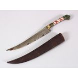 A 19TH CENTURY INDIAN DAGGER with jade and mother of pearl inlaid hilt, 28cm long.