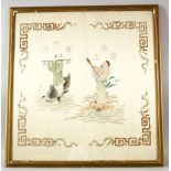 A CHINESE SILK EMBROIDERED PICTURE, depicting two male musicians, one standing on a crab, the