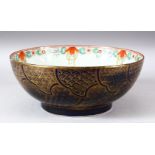 A CHINESE FAMILLE ROSE PORCELAIN BOWL, the exterior with blue ground and gilt decoration, 28cm