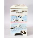 A JAPANESE 4 TIER PORCELAIN STACKING VESSEL - each section removing - decorated with scenes of