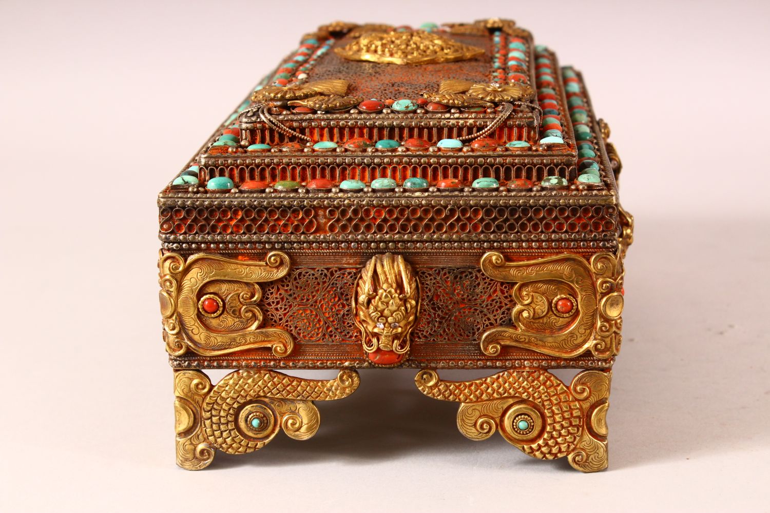 A TIBETAN MOUNTED AND INLAID METAL CASKET, the body with openwork style inlay, with gilt raised - Image 4 of 7